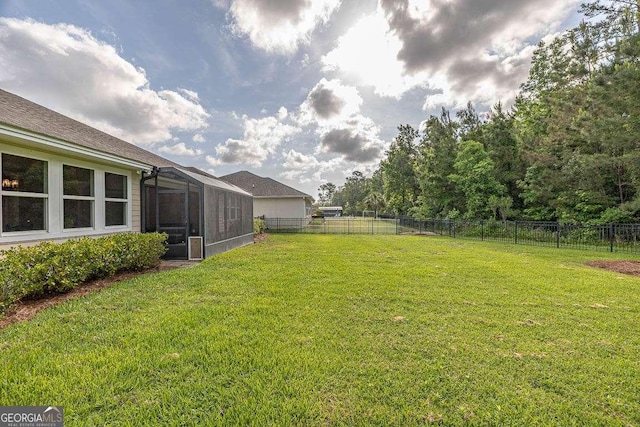 view of yard featuring a fenced backyard