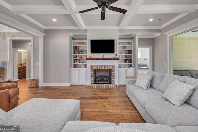 living area featuring recessed lighting, wood finished floors, ceiling fan, and coffered ceiling