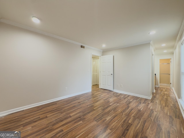 3301 Henderson Mill Rd Unit D3, Atlanta, GA 30341 - unfurnished room featuring crown molding, dark wood-style flooring, and baseboards