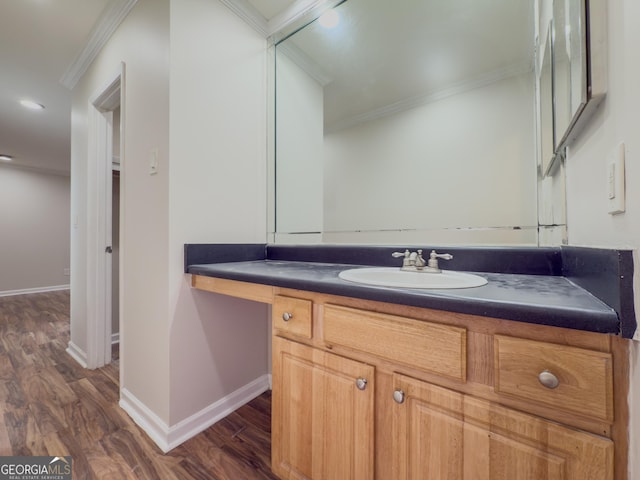 3301 Henderson Mill Rd Unit D3, Atlanta, GA 30341 - bathroom featuring crown molding, vanity, wood finished floors, baseboards, and recessed lighting