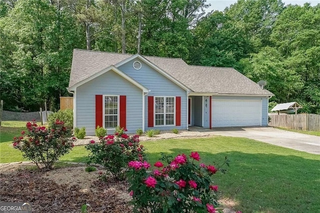 2889 Estuary Dr, Acworth, GA 30101 - ranch-style home featuring fence, an attached garage, concrete driveway, a front yard, and a shingled roof