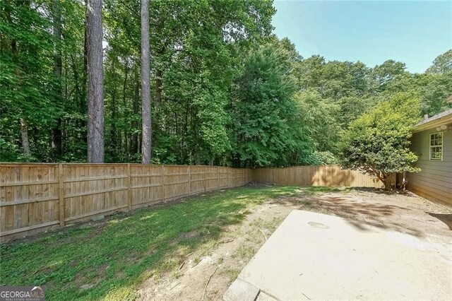 2889 Estuary Dr, Acworth, GA 30101 - view of yard with a fenced backyard and a patio