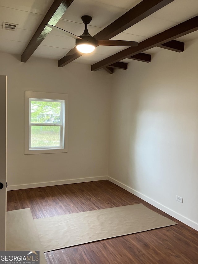 854 Clearwater Rd, Sharpsburg, GA 30277 - empty room featuring dark wood-style flooring, ceiling fan, and baseboards