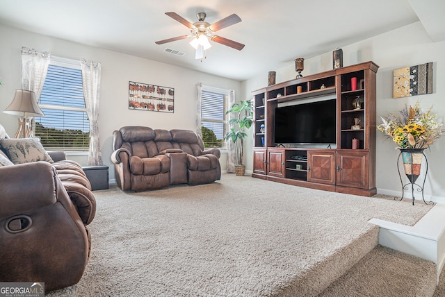 3399 In Bloom Way, Auburn, GA 30011 - carpeted living area featuring ceiling fan and baseboards