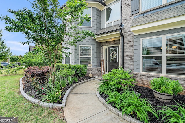 3399 In Bloom Way, Auburn, GA 30011 - view of exterior entry featuring a lawn and brick siding