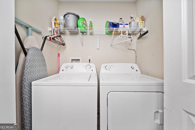 laundry room with washer and clothes dryer