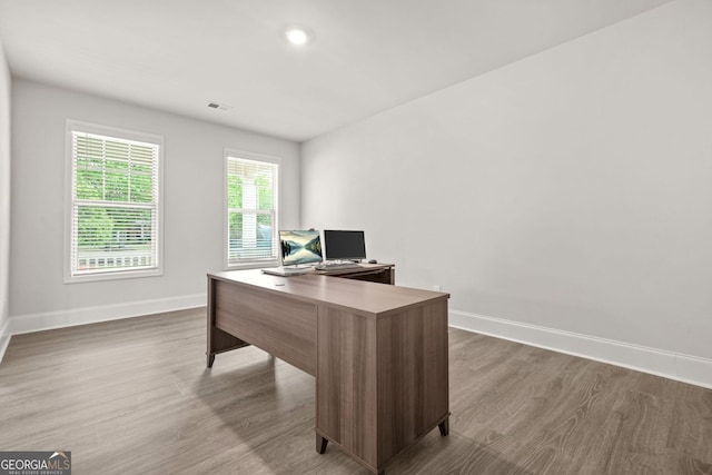 1606 Chancery Ln, Lithia Springs, GA 30122 - office area with wood finished floors, baseboards, and recessed lighting