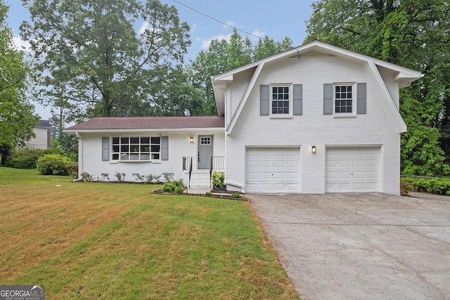 3182 Wakefield Dr, Decatur, GA 30034 - tri-level home with concrete driveway, a front yard, an attached garage, and brick siding
