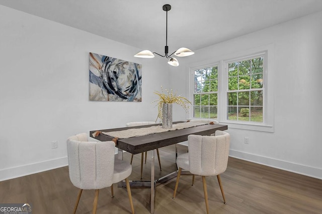 3182 Wakefield Dr, Decatur, GA 30034 - dining area featuring a notable chandelier, wood finished floors, and baseboards