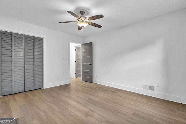 3182 Wakefield Dr, Decatur, GA 30034 - unfurnished bedroom with a closet, visible vents, wood finished floors, and baseboards