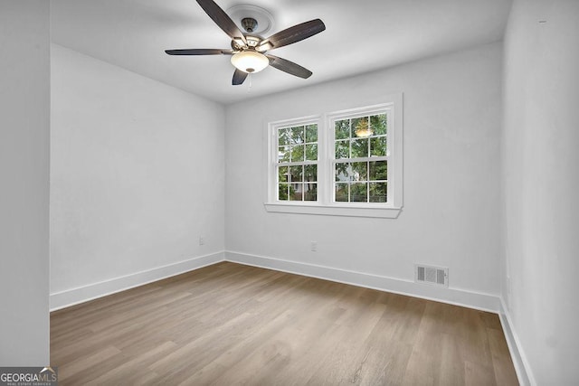 3182 Wakefield Dr, Decatur, GA 30034 - spare room featuring a ceiling fan, visible vents, wood finished floors, and baseboards
