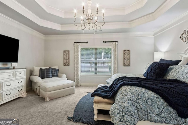 carpeted bedroom with a raised ceiling, an inviting chandelier, and crown molding