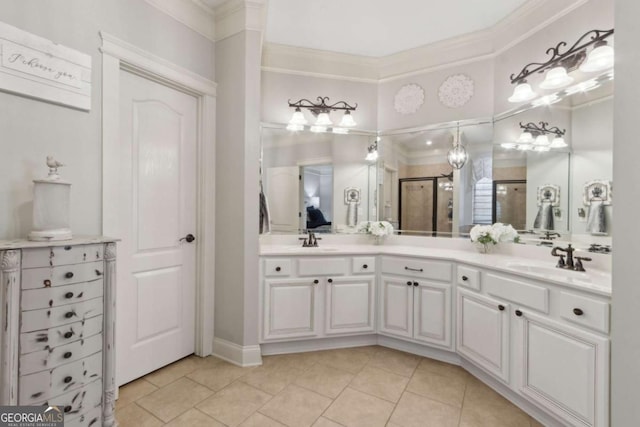 full bathroom with a shower stall, ornamental molding, and a sink