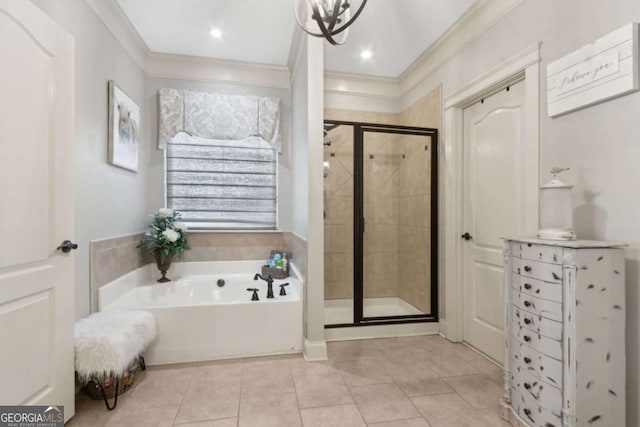full bathroom featuring tile patterned floors, a garden tub, a shower stall, and ornamental molding