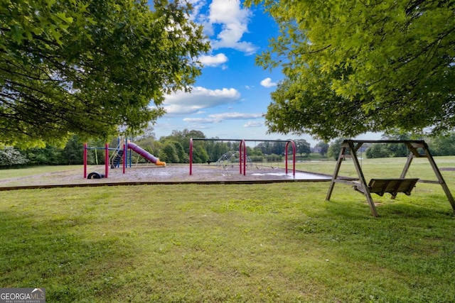 communal playground with a lawn