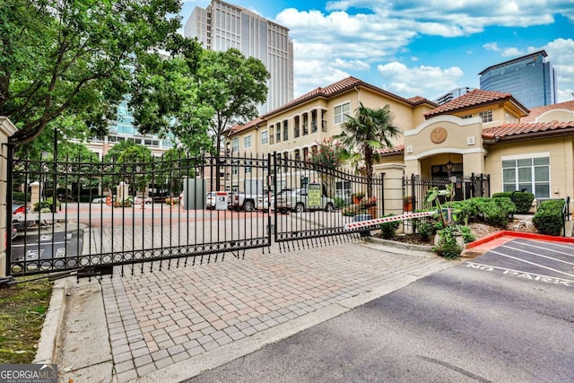 view of gate featuring fence