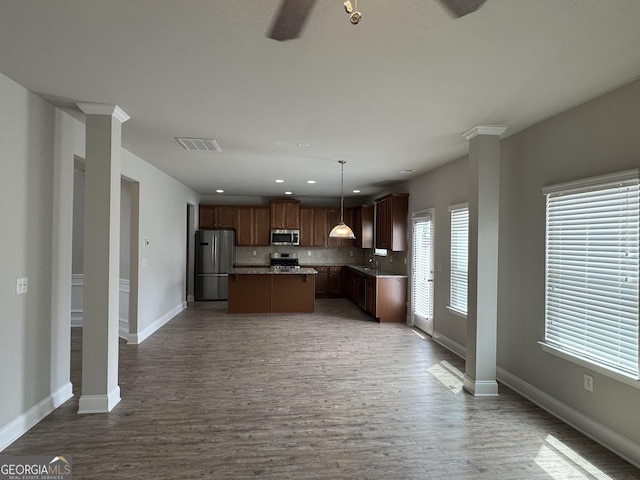 3592 Hancock Vw, Decatur, GA 30034 - kitchen featuring tasteful backsplash, visible vents, baseboards, appliances with stainless steel finishes, and wood finished floors