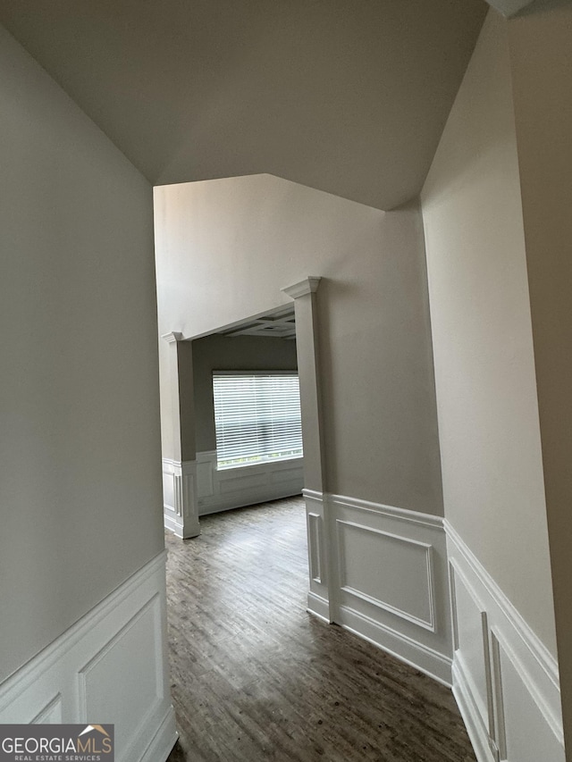 3592 Hancock Vw, Decatur, GA 30034 - hallway with wainscoting, dark wood-style flooring, lofted ceiling, and a decorative wall