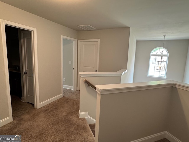 3592 Hancock Vw, Decatur, GA 30034 - hall featuring an upstairs landing, visible vents, carpet floors, and baseboards