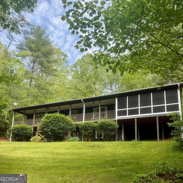 3517 Duncan Bridge Rd, Cleveland, GA 30528 - rear view of house with a lawn