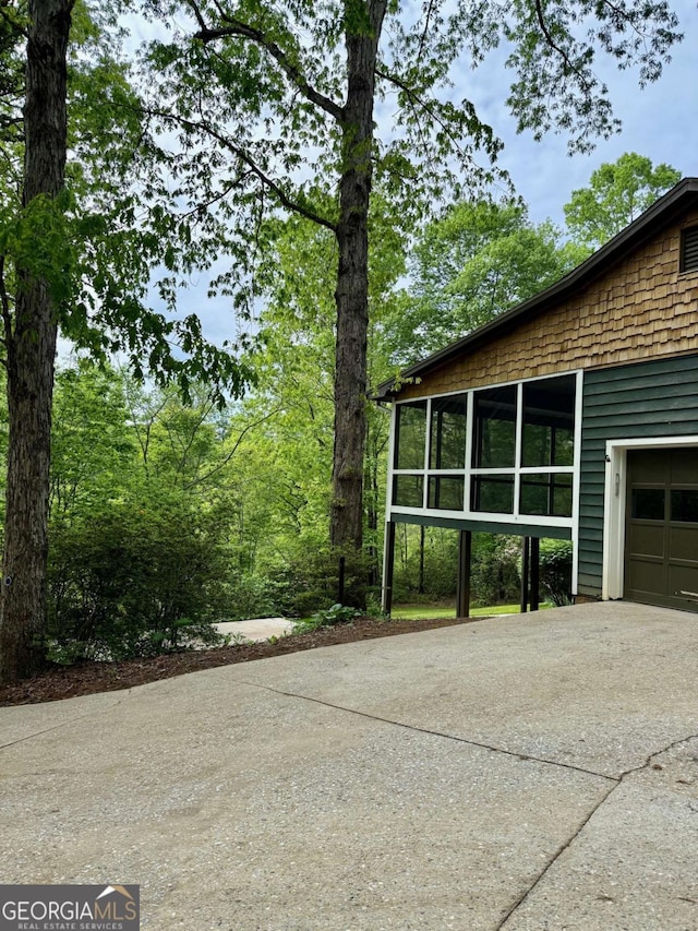 3517 Duncan Bridge Rd, Cleveland, GA 30528 - view of home's exterior featuring driveway and a garage