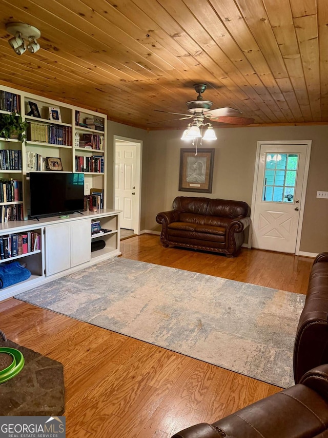 3517 Duncan Bridge Rd, Cleveland, GA 30528 - living area with baseboards, wooden ceiling, wood finished floors, and a ceiling fan