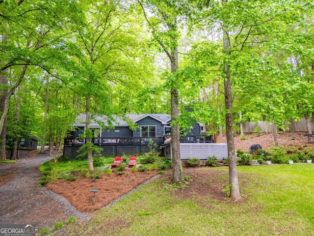 1860 Apalachee Woods Trl, Buckhead, GA 30625 - view of front facade featuring a deck and fence