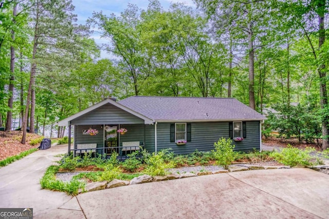 1860 Apalachee Woods Trl, Buckhead, GA 30625 - ranch-style house featuring covered porch, concrete driveway, and roof with shingles