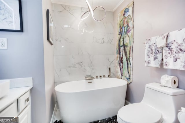 1860 Apalachee Woods Trl, Buckhead, GA 30625 - full bathroom with toilet, a freestanding tub, ornamental molding, and vanity