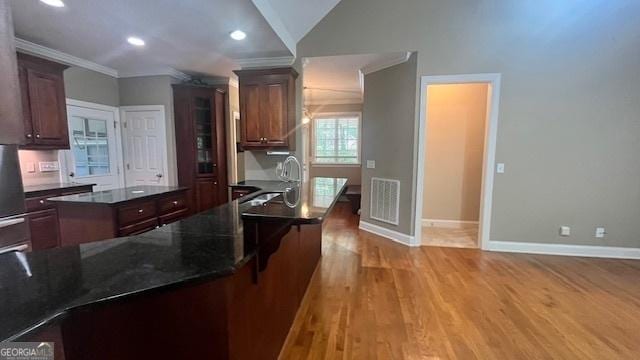 169 Cambridge Way, Macon, GA 31220 - kitchen with ornamental molding, a sink, baseboards, light wood-style floors, and recessed lighting