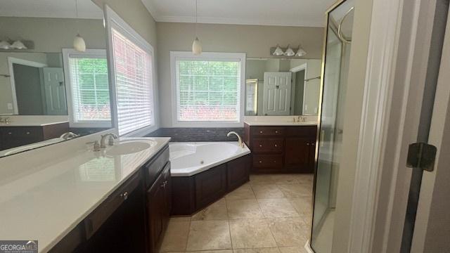169 Cambridge Way, Macon, GA 31220 - bathroom with two vanities, a shower stall, a bath, and tile patterned floors
