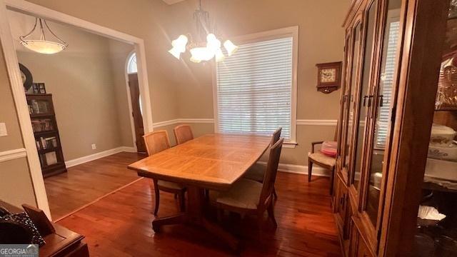169 Cambridge Way, Macon, GA 31220 - dining area featuring a chandelier, dark wood-style flooring, and baseboards