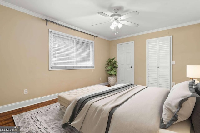 798 Saint Charles Ave NE Unit 7, Atlanta, GA 30306 - bedroom featuring wood finished floors, a closet, baseboards, a ceiling fan, and crown molding