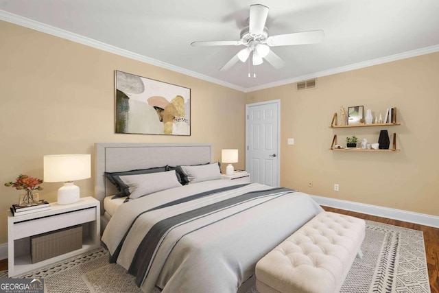 798 Saint Charles Ave NE Unit 7, Atlanta, GA 30306 - bedroom featuring wood finished floors, ornamental molding, baseboards, visible vents, and a ceiling fan