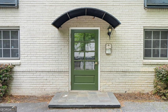 798 Saint Charles Ave NE Unit 7, Atlanta, GA 30306 - doorway to property featuring brick siding