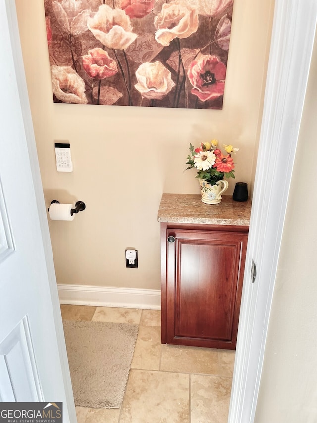 4614 Capers Xing W, Peachtree Corners, GA 30092 - bathroom with baseboards and tile patterned flooring