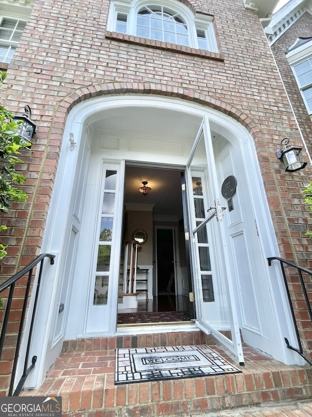 4614 Capers Xing W, Peachtree Corners, GA 30092 - doorway to property with brick siding