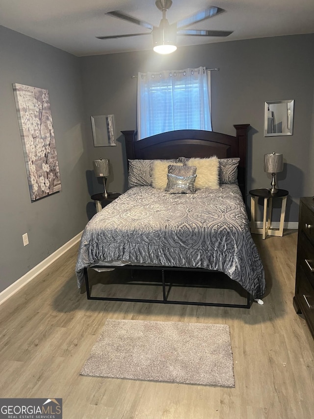 1962 Markone St NW, Atlanta, GA 30318 - bedroom with a ceiling fan, wood finished floors, and baseboards