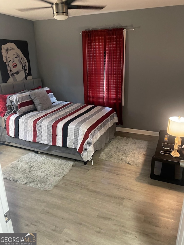 1962 Markone St NW, Atlanta, GA 30318 - bedroom featuring a ceiling fan, wood finished floors, and baseboards