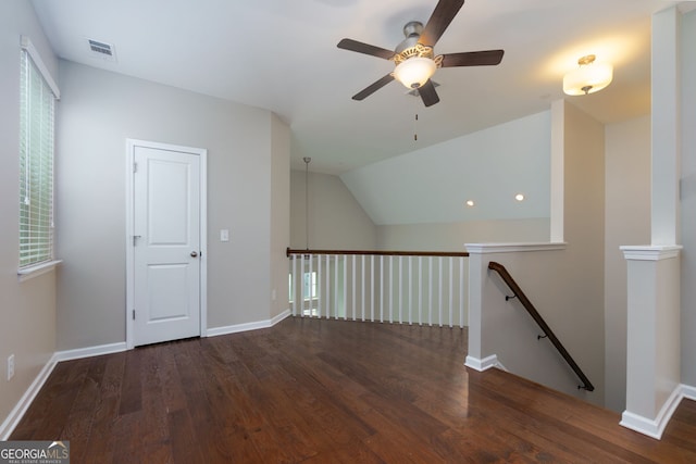 569 Mirrormont Dr SE, Smyrna, GA 30080 - hallway featuring an upstairs landing, wood finished floors, lofted ceiling, plenty of natural light, and recessed lighting
