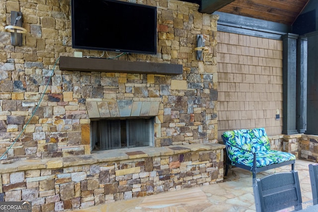569 Mirrormont Dr SE, Smyrna, GA 30080 - detailed view of a stone fireplace and stone siding