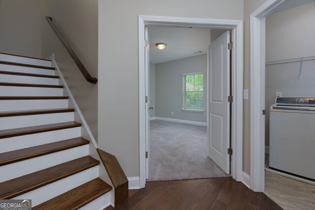 569 Mirrormont Dr SE, Smyrna, GA 30080 - stairway featuring washer / dryer and wood finished floors