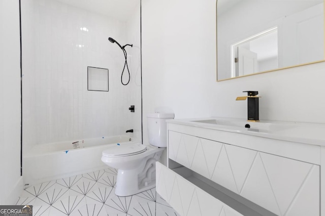 bathroom with vanity, bathing tub / shower combination, and toilet
