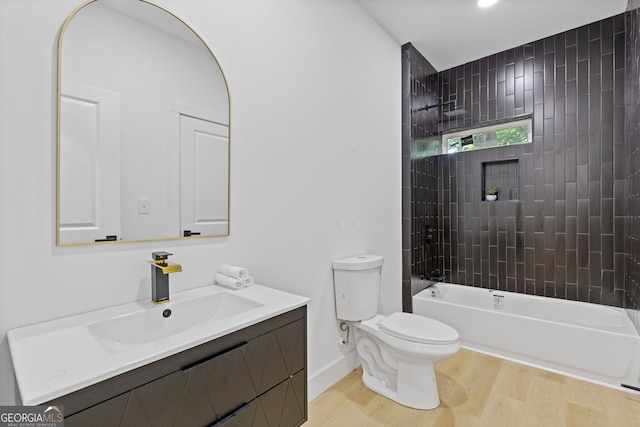 906 Mcdaniel St, Atlanta, GA 30310 - full bath with wood finished floors, vanity, toilet, shower / bathtub combination, and baseboards