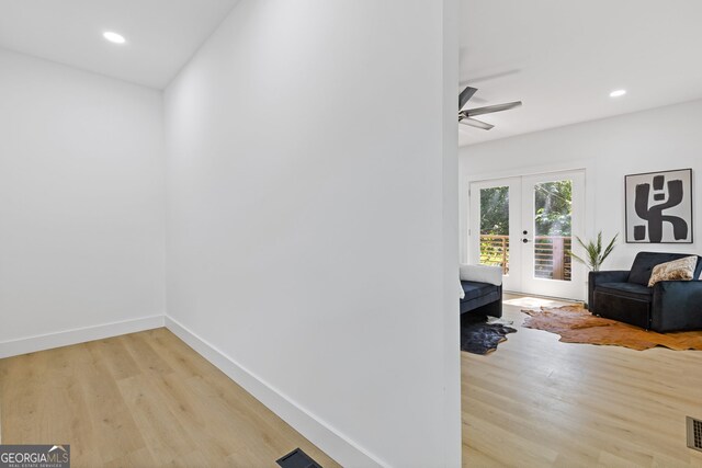 906 Mcdaniel St, Atlanta, GA 30310 - hallway with light wood-type flooring, recessed lighting, baseboards, and french doors