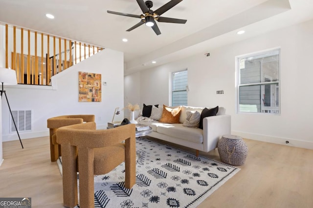 living room with recessed lighting and light wood finished floors