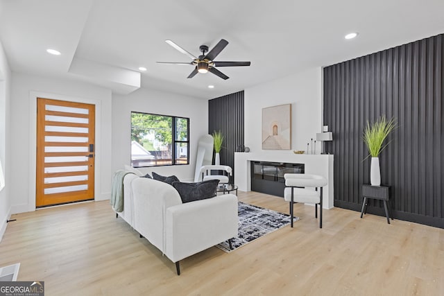 906 Mcdaniel St, Atlanta, GA 30310 - living room featuring wood finished floors, ceiling fan, recessed lighting, and a glass covered fireplace