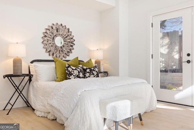 bedroom featuring wood finished floors