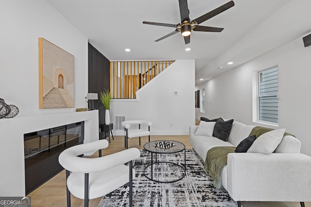 906 Mcdaniel St, Atlanta, GA 30310 - living room featuring recessed lighting, wood finished floors, a ceiling fan, stairs, and baseboards