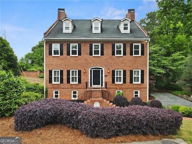 100 Barnard Pl, Atlanta, GA 30328 - view of front facade with brick siding and a chimney